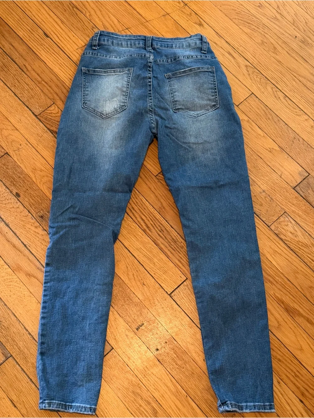 Classic Women's Skinny Jeans in Distressed Dark Blue